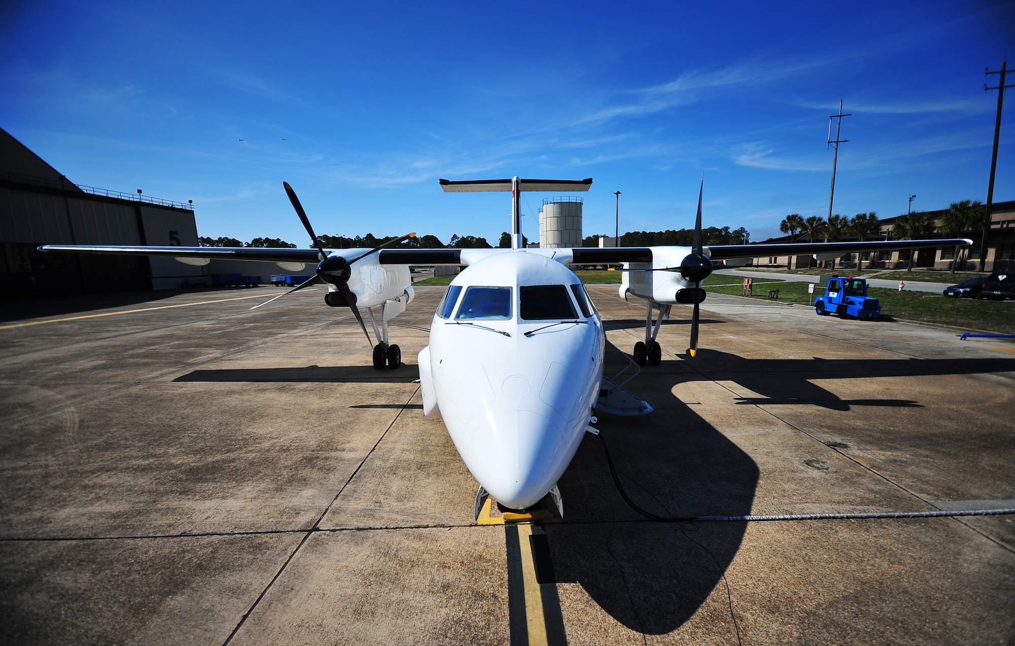 An E-9A Widget sits on the flight line in front of hangar 5 Mar. 3 at the 82nd Aerial Target Squadron. The Widget is a modified version of the Bombardier Dash-8, formerly Canadian De Havilland. The modified civilian Dash-8 was brought into service in 1988 and is assigned to the 53rd Weapons Evaluation Group. (U.S. Air Force photo by Airman 1st Class Dustin Mullen/Released)