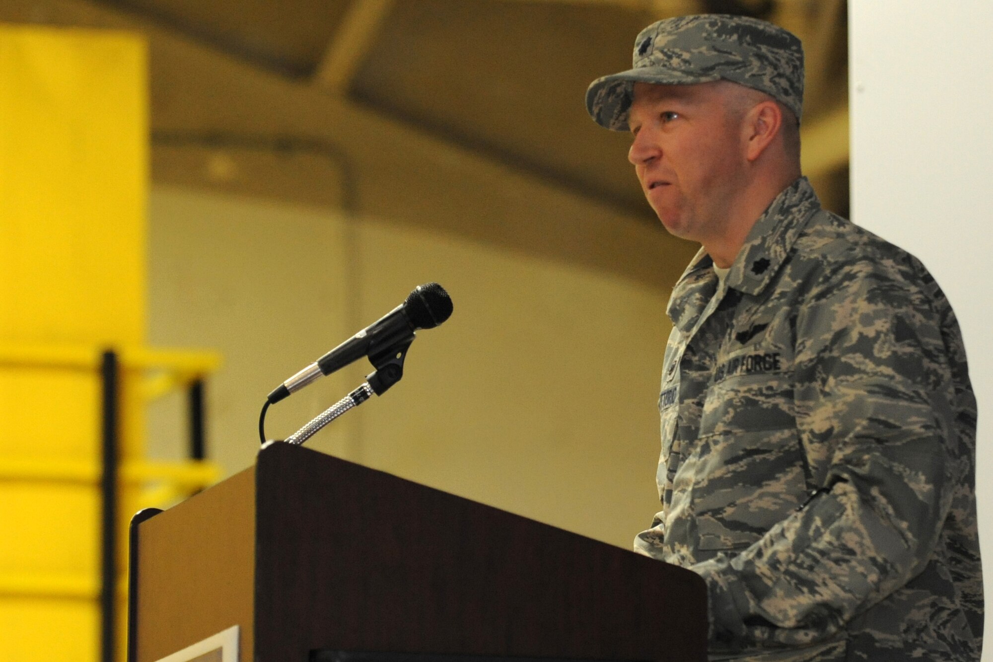 Lt. Col. Ernesto Divittorio, 4th Operations Support Squadron incoming commander, addresses the audience during the squadron’s change of command ceremony at Seymour Johnson Air Force Base, North Carolina, Feb. 27, 2015. The 4th OSS provides several support functions, including air traffic control, weather analysis, intelligence services and aircrew flight equipment. (U.S. Air Force photo/Senior Airman Ashley J. Thum)