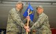 Lt. Col. Ernesto Divittorio, 4th Operations Support Squadron incoming commander, accepts the guidon from Col. Brian Afflerbaugh, 4th Operations Group commander, at the squadron’s change of command ceremony at Seymour Johnson Air Force Base, North Carolina, Feb. 27, 2015. Divittorio accepted command of the squadron which was formerly led by Lt. Col. Christine Mau. (U.S. Air Force photo/Senior Airman Ashley J. Thum)
