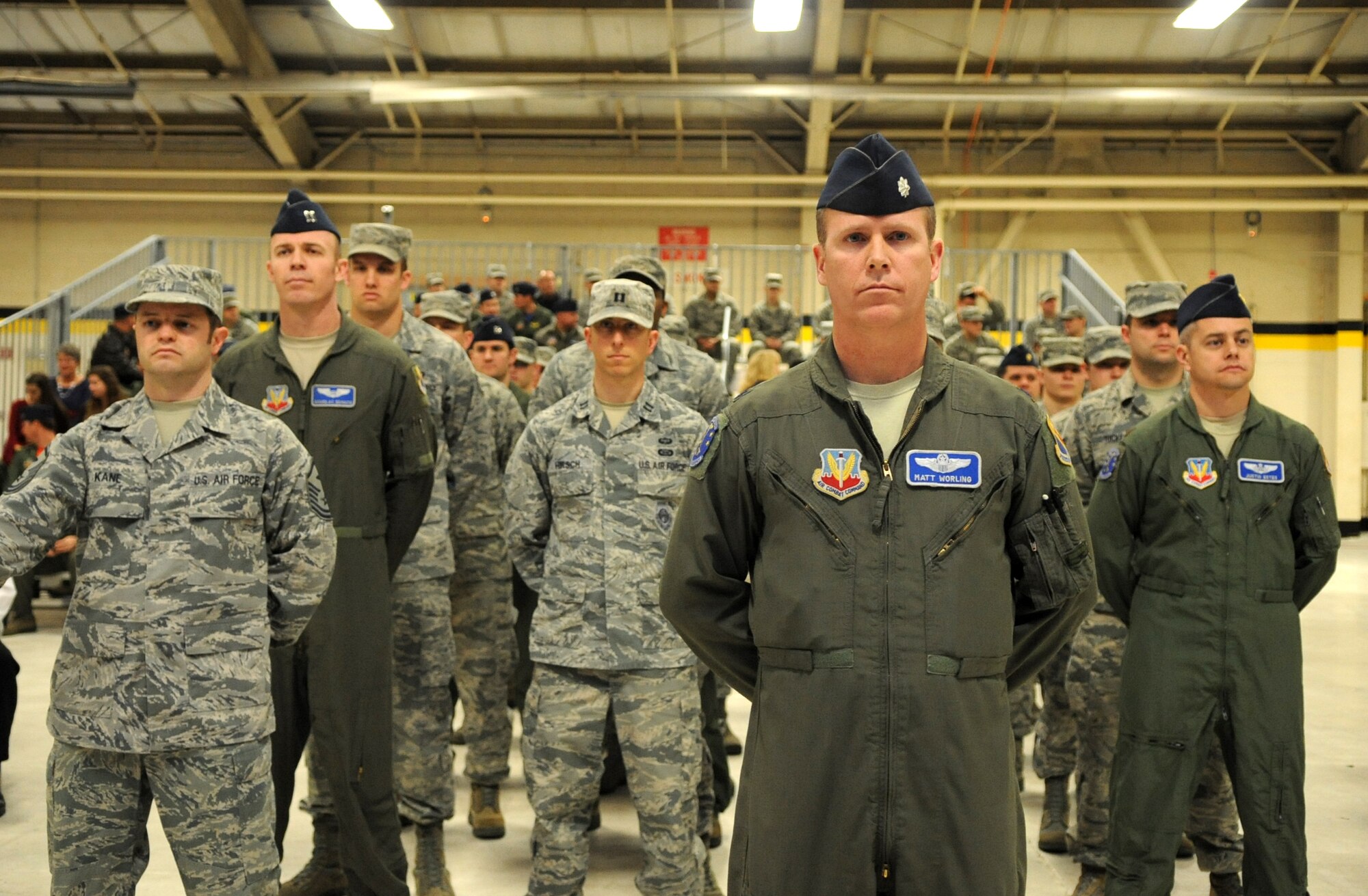 Airmen from the 4th Operations Support Squadron stand at parade rest prior to the squadron’s change of command ceremony at Seymour Johnson Air Force Base, North Carolina, Feb. 27, 2015. Base and community leadership, along with friends and family of the squadron’s incoming and outgoing commanders, gathered to witness the traditional passing of the guidon. (U.S. Air Force photo/Senior Airman Ashley J. Thum)