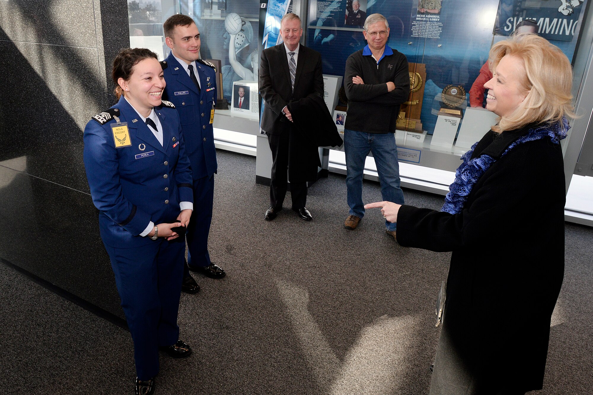 Veteran Affairs undersecretary and NCLS closing speaker Allison Hickey chats with cadet speaker escorts Feb. 27, 2015, during the Academy’s 22nd annual National Character and Leadership Symposium. Hickey is a 1980 Academy graduate and served 27 years in the Air Force, reaching the rank of brigadier general before retiring in 2007. (U.S. Air Force photo/Mike Kaplan)