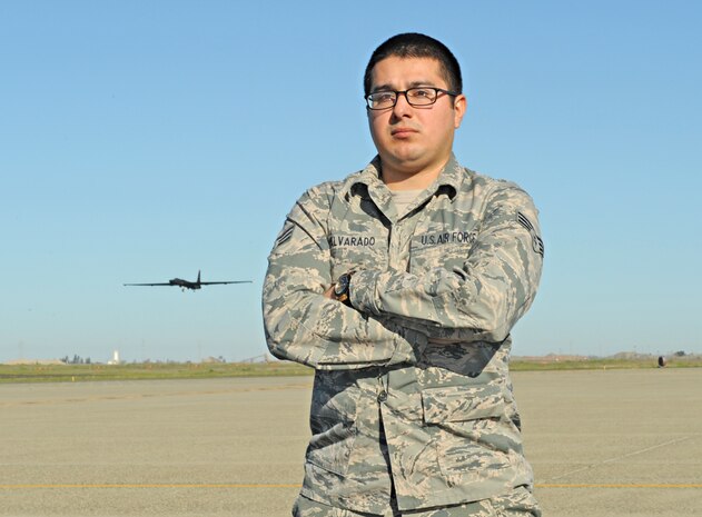 Senior Airman Rolando Alvarado, 9th Force Support Squadron force management technician, poses for a photo on the flightline at Beale Air Force Base, Calif., March 4, 2015. Alvarado has been enlisted since December 2011. (U.S. Air Force photo by Airman 1st Class Ramon A. Adelan/Released)