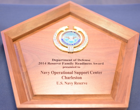Principle Deputy Assistant Secretary of Defense for Reserve Affairs, Richard O. Wightman, Jr. presents the 2014 Reserve Family Readiness Awards to the top units in the seven Reserve and National Guard services at a ceremony Feb. 27, 2015 at the Pentagon's Hall of Heroes. The Reserve Family Readiness Award is given to the unit in each of the seven services that demonstrates excellence in engaging with and supporting their members' families. Their unit's leaders found new and impacting ways to connect with families, which is incredibly important when the unit is preparing to deploy, during deployment and after they return home. The leaders recognized today represent the best in the country for their efforts in 2014. (DoD photo by Steve Turner, Office of the Secretary of Defense, Reserve Affairs)