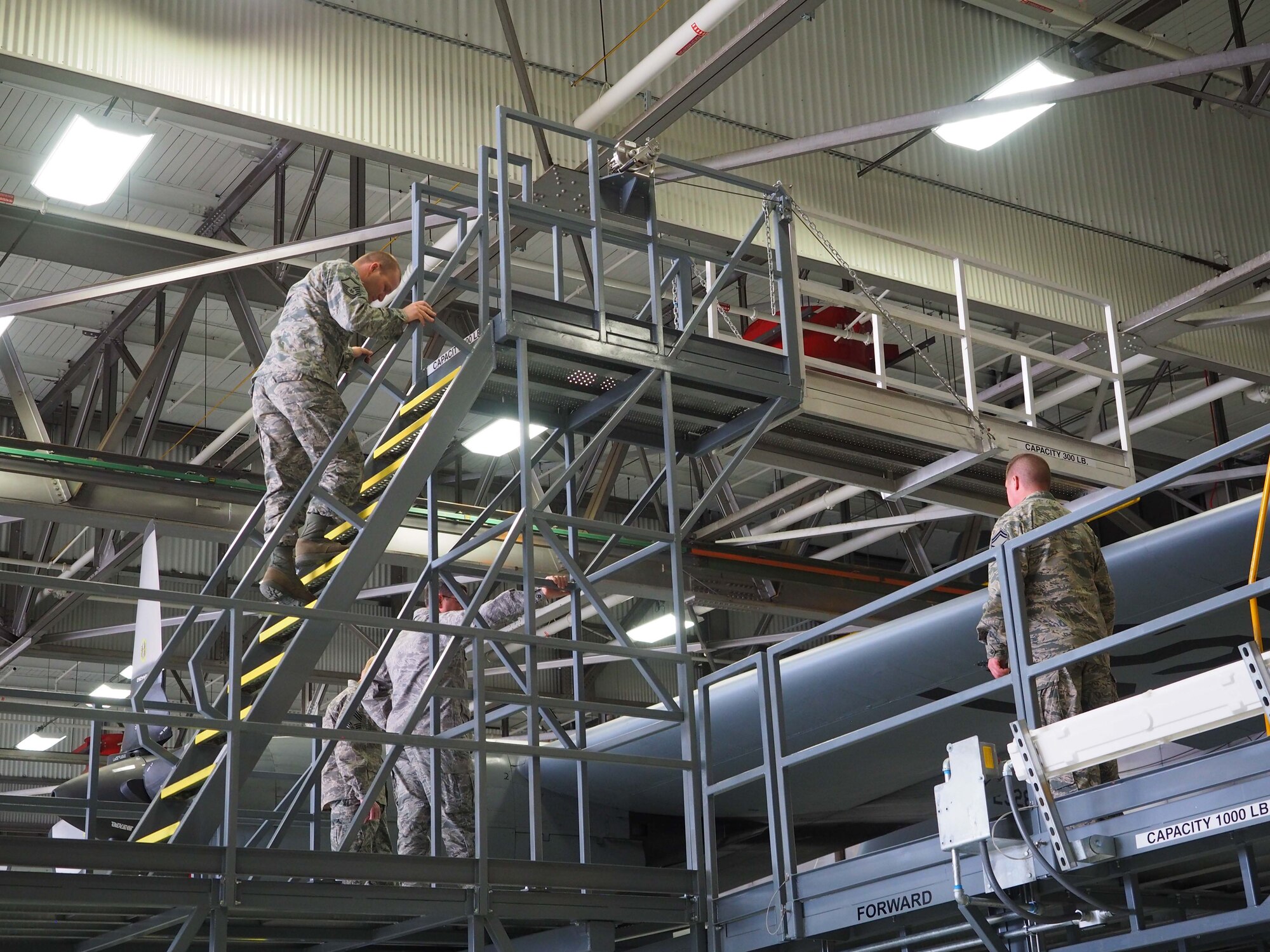 The new ISO stand provides quicker and safer access to all areas of the C-130 compared to the old stand system. (Air Force Photo/Paul Zadach)