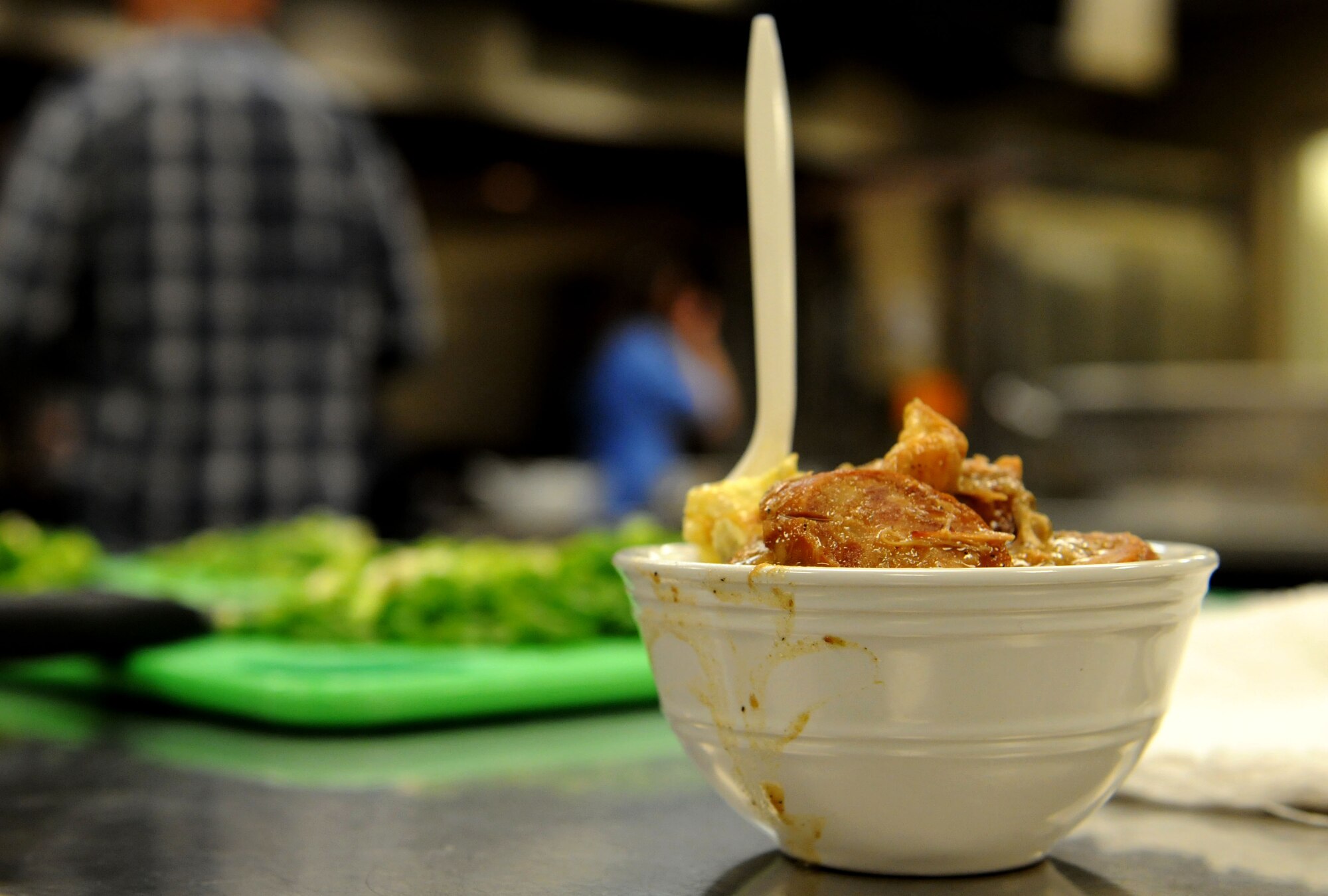 A bowl of gumbo is displayed at a gumbo cooking class held by the 81st Force Support Squadron’s Single Airman Program Feb. 26, 2015, at the Mississippi Gulf Coast Community College, Perkinston, Miss. Served with jasmine rice and potato salad, this version of gumbo has andouille sausage, shrimp, chicken and a savory broth.  (U.S. Air Force photo by Airman 1st Class Duncan McElroy)
