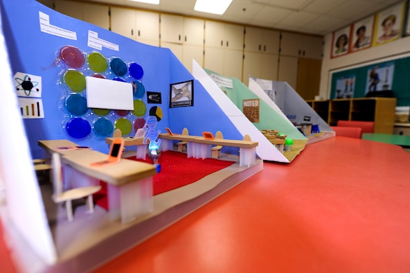 Maxwell Elementary-Middle School’s Double ’O‘ Robots team designed classroom dioramas showcasing ways a classroom could be arranged to provide optimal learning, March 2, 2015, Maxwell Air Force Base, Alabama. The dioramas were part of the research portion of the FIRST LEGO League competition and were the end result of the students’ research on learning styles and ways to ensure everyone is engaged in learning. (U.S. Air Force photo by Airman 1st Class Alexa Culbert/Cleared)