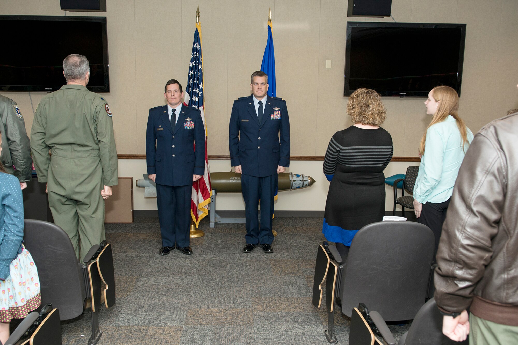 Family, friends and coworkers attend a retirement ceremony for U.S. Air Force Maj. Matthew Callow, Feb. 27, 2015, Barksdale Air Force Base, La. Callow is a B-52H Stratofortress pilot assigned to the 11th Bomb Squadron and is retiring from the Air Force after 20 years of service. (U.S. Air Force photo by Master Sgt. Greg Steele/Released)