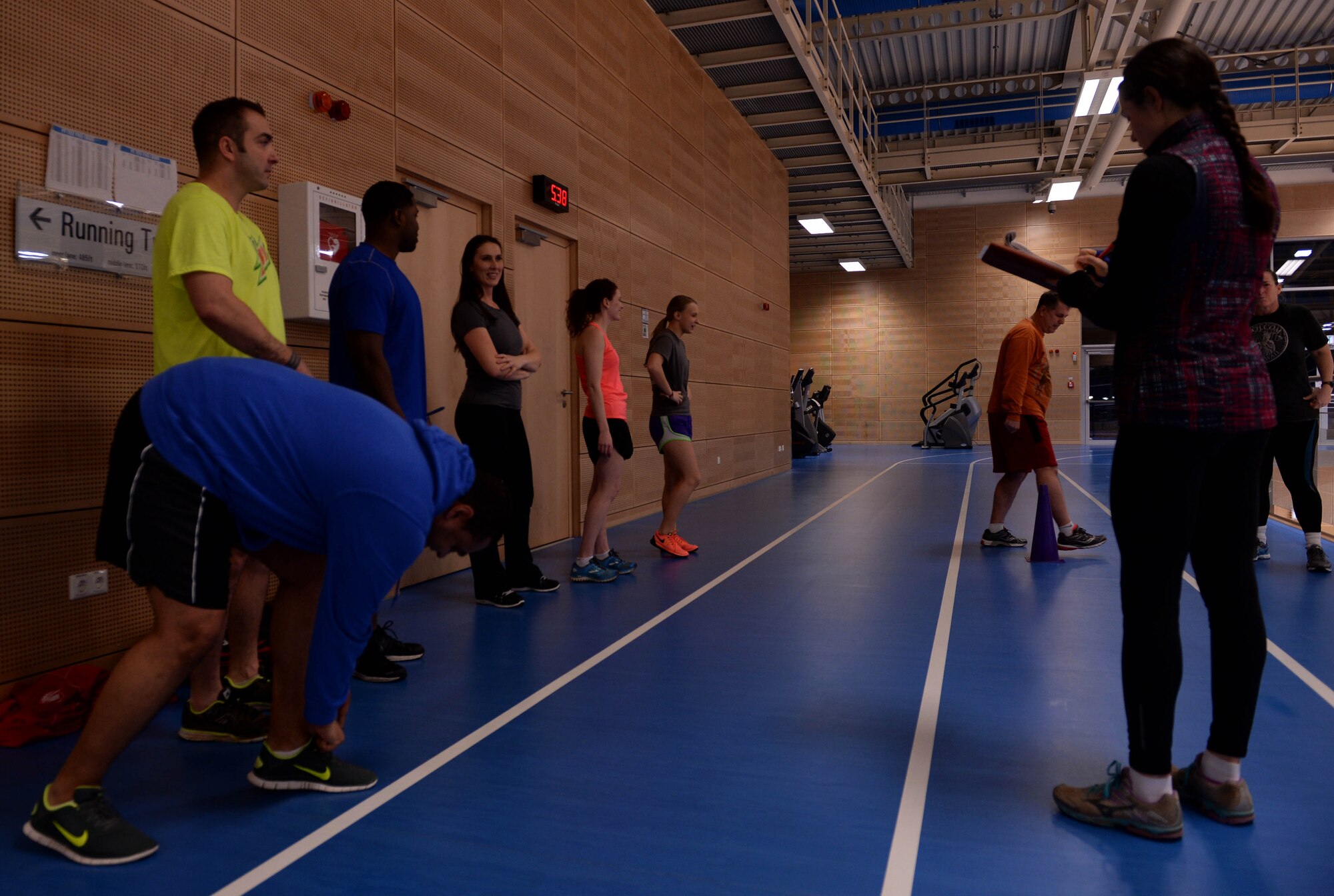 U.S. Air Force Capt. Denise Campbell, 52nd Aerospace Medicine Squadron health promotion dietitian, briefs the participants of the Turbo-Charged Challenge #2 at the Eifel Powerhaus at Spangdahlem Air Base, Germany, Jan. 27, 2015. Campbell, co-facilitator of the Largest Loser Campaign, oversees the six-week program intended to aid challengers live a healthier lifestyle. (U.S. Air Force photo by Airman 1st Class Timothy Kim/Released)