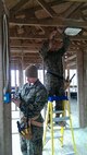 Marines practice interior wiring.