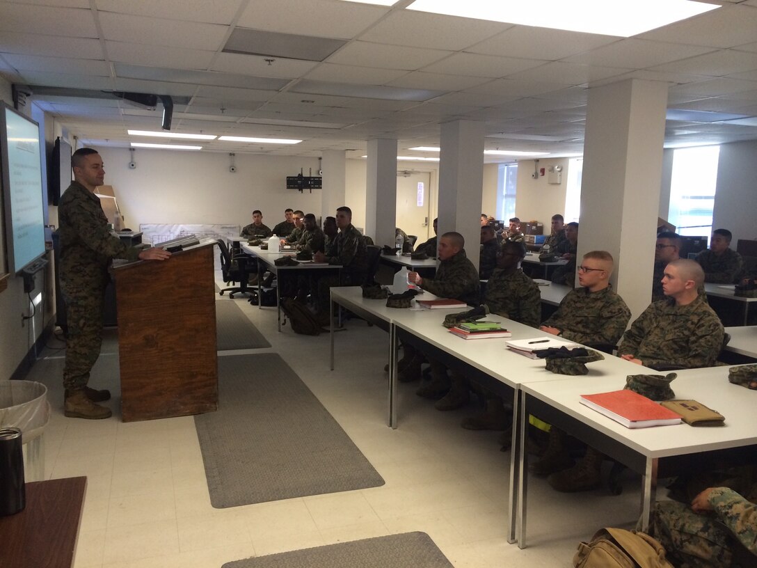 Marines from BE 4-15 receive their pick-up brief from the Company Commander.