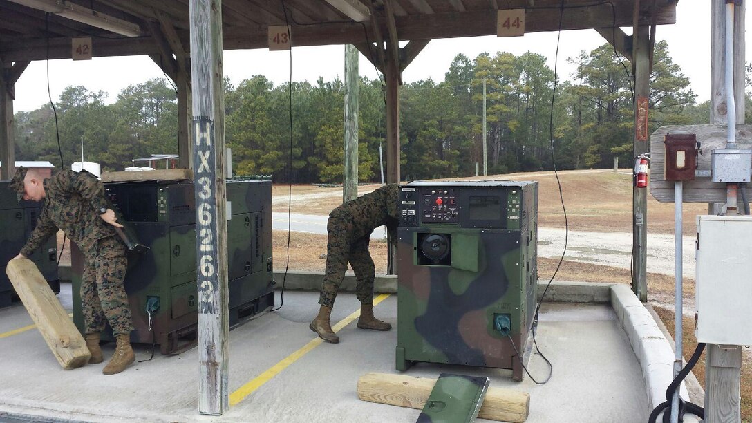 Marines performing a practical application on the MEP 805B.