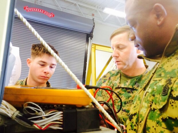 Marines working on a an 807.