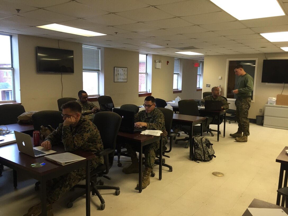 Marines learning about field planning preparation.