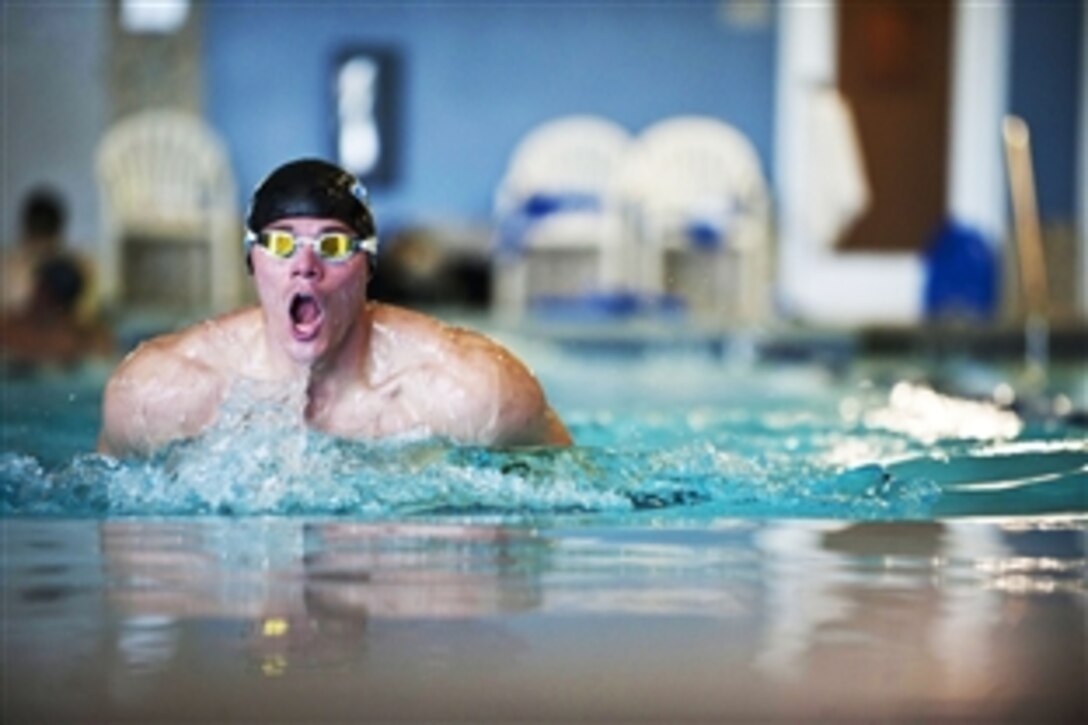 Timothy Babb takes a breath during swimming practice on Nellis Air Force Base, Nev., Feb. 27, 2015. The Air Force Trials are an adaptive sports event designed to promote the mental and physical well-being of seriously ill and injured military members and veterans.