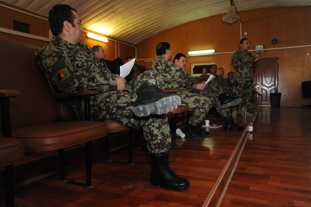 An Afghan Air Force officer speaks at a recent command and control shurra in Kabul, Afghanistan.  The shurra brought members of the Afghan Air Force together with Train, Assist, Advise Command-Air advisors to plan the way ahead for aerial fires support. (U.S. Air Force photo by Senior Master Sgt. J. LaVoie/Released)