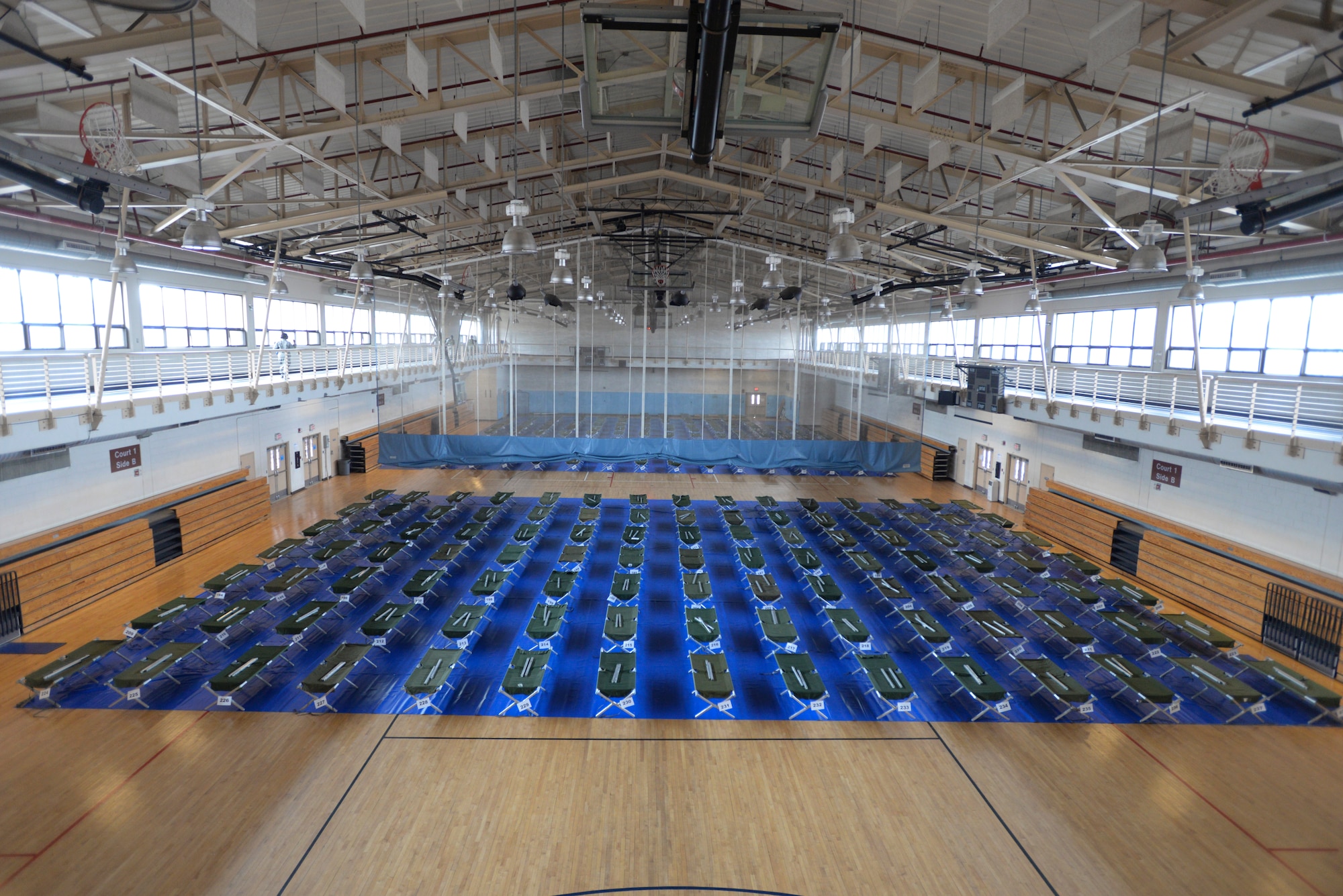 Cots are set up in the Fitness Center to provide follow-on forces during operational readiness exercise Beverly Midnight 15-01 March 2, 2015, at Osan Air Base, Republic of Korea. The cots were used to help receive and sustain more than 200 follow-on forces on base during the exercise. (U.S. Air Force photo by Senior Airman David Owsianka)
