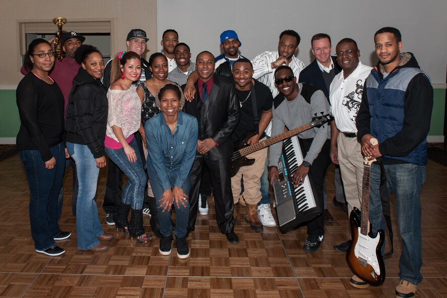 Wolf Pack Airmen pose for a group photo after a musical and masquerade event held at the Loring Club at Kunsan Air Base, Republic of Korea, Feb. 28, 2015. The event was in celebration of 100 years of music influenced by African American culture, as part of African American/Black History Month at Kunsan. (U.S. Air Force photo by Senior Airman Taylor Curry/Released) 