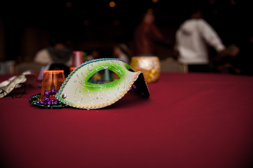 Masks are displayed for attendees to wear during a musical and masquerade event held at the Loring Club at Kunsan Air Base, Republic of Korea, Feb. 28, 2015. The event was in celebration of 100 years of music influenced by African American culture, as part of African American/Black History Month at Kunsan. (U.S. Air Force photo by Senior Airman Taylor Curry/Released) 