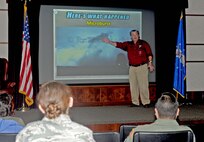 Cody Charvat, Sedgwick County training and exercise officer, teaches a storm spotter training class, March 3, 2015, at McConnell Air Force Base, Kan. The interactive class was designed to educate participants about how to recognize and react to severe weather conditions. (U.S. Air Force photo by Airman 1st Class Tara Fadenrecht)