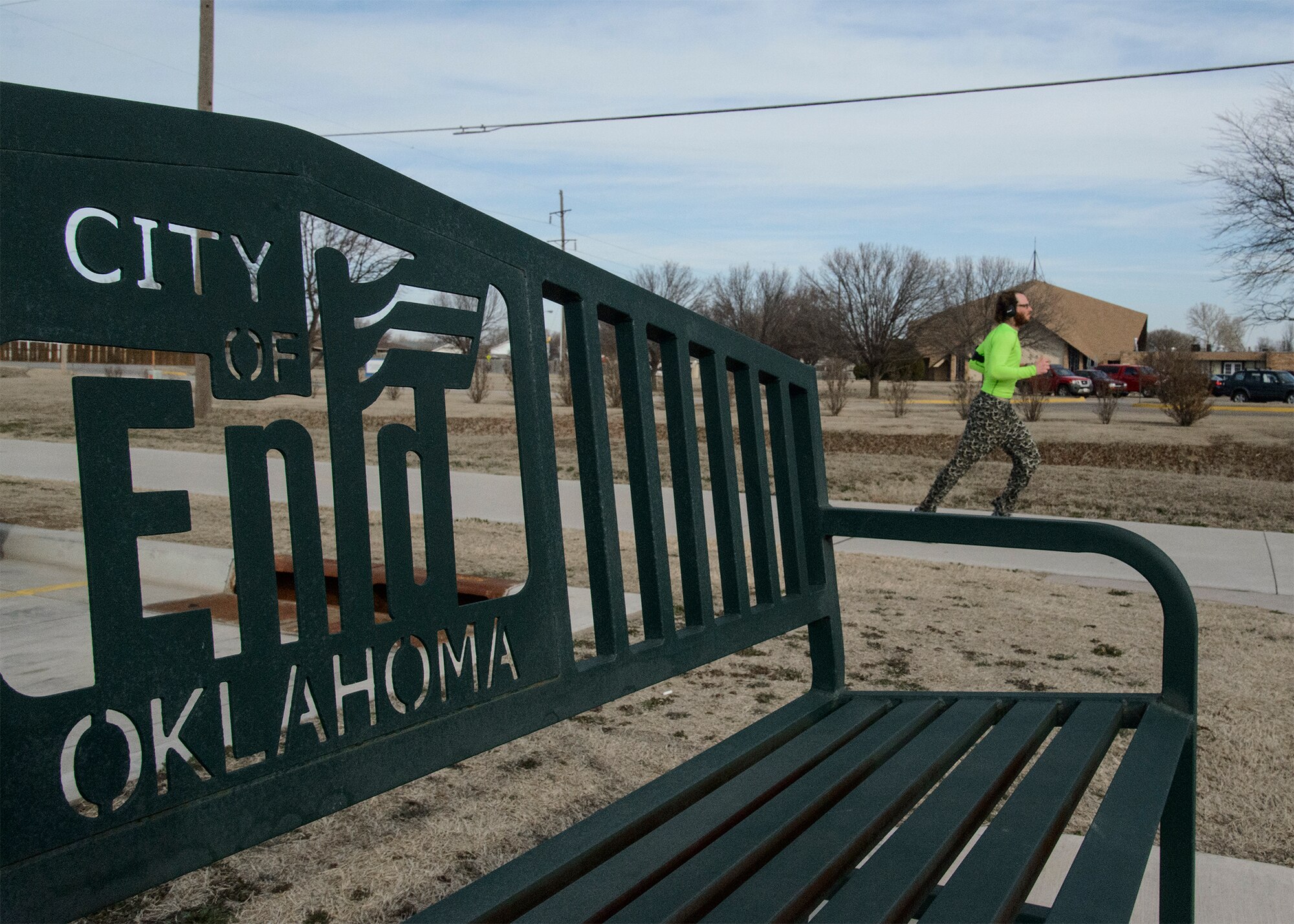 A man runs on Railroad Pass Trail in Enid, Feb. 26. Airmen and local residents ran in the 2015 5K Warren Edds Memorial Fun Run/Walk in support of Special Olympics Oklahoma. (U.S. Air Force photo / David Poe)