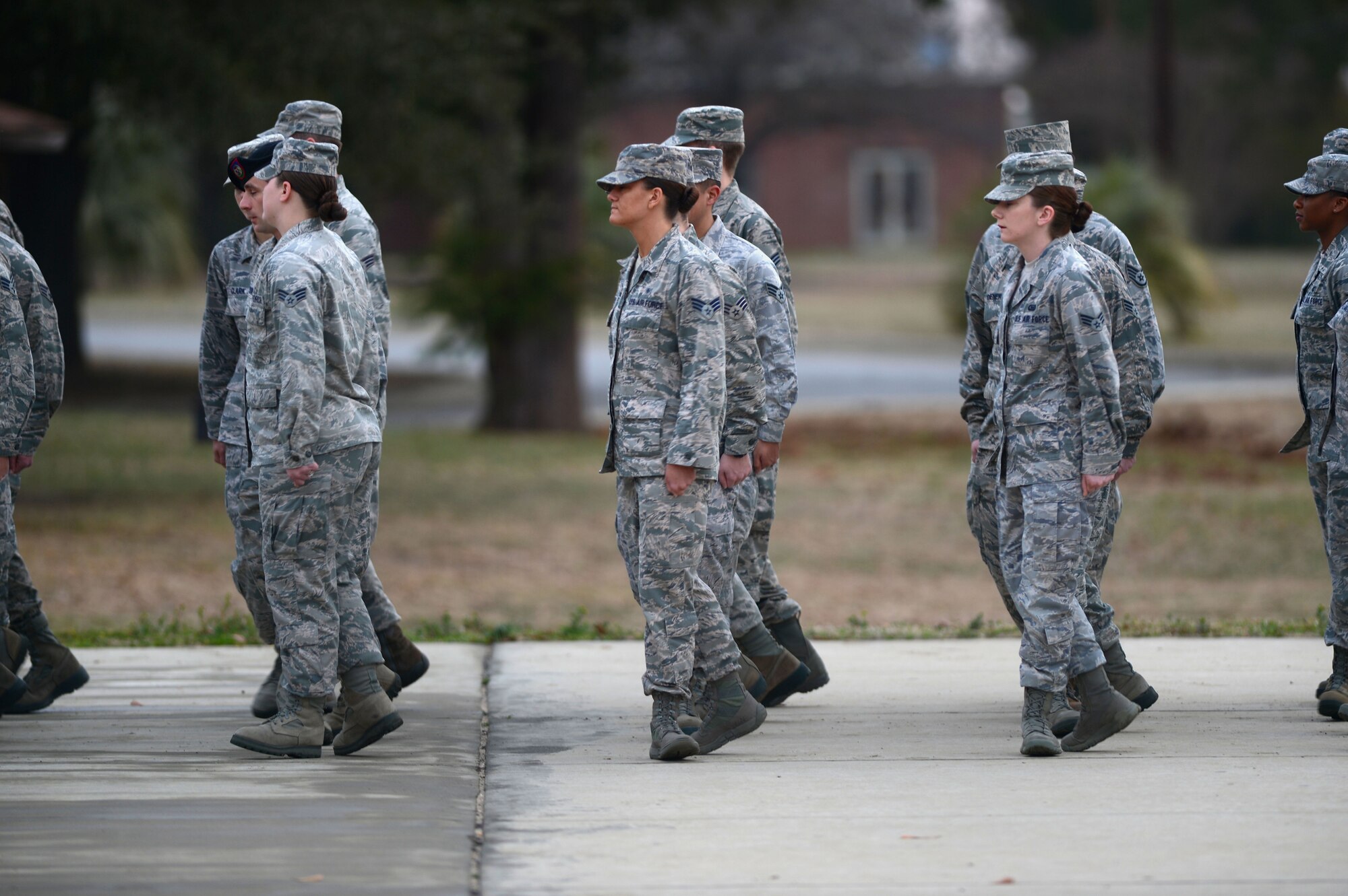 U.S. Air Force Airmen assigned to the Senior Master Sgt. David B. Reed Airman Leadership School Class 15-03 perform a facing movement prior to a uniform inspection at Shaw Air Force Base, S.C., March 5, 2015. Before starting the inspection, each of the four ALS flights ensured their dress and cover by a process called “tall-or-tap”. (U.S. Air force photo by Senior Airman Jensen Stidham/Released)