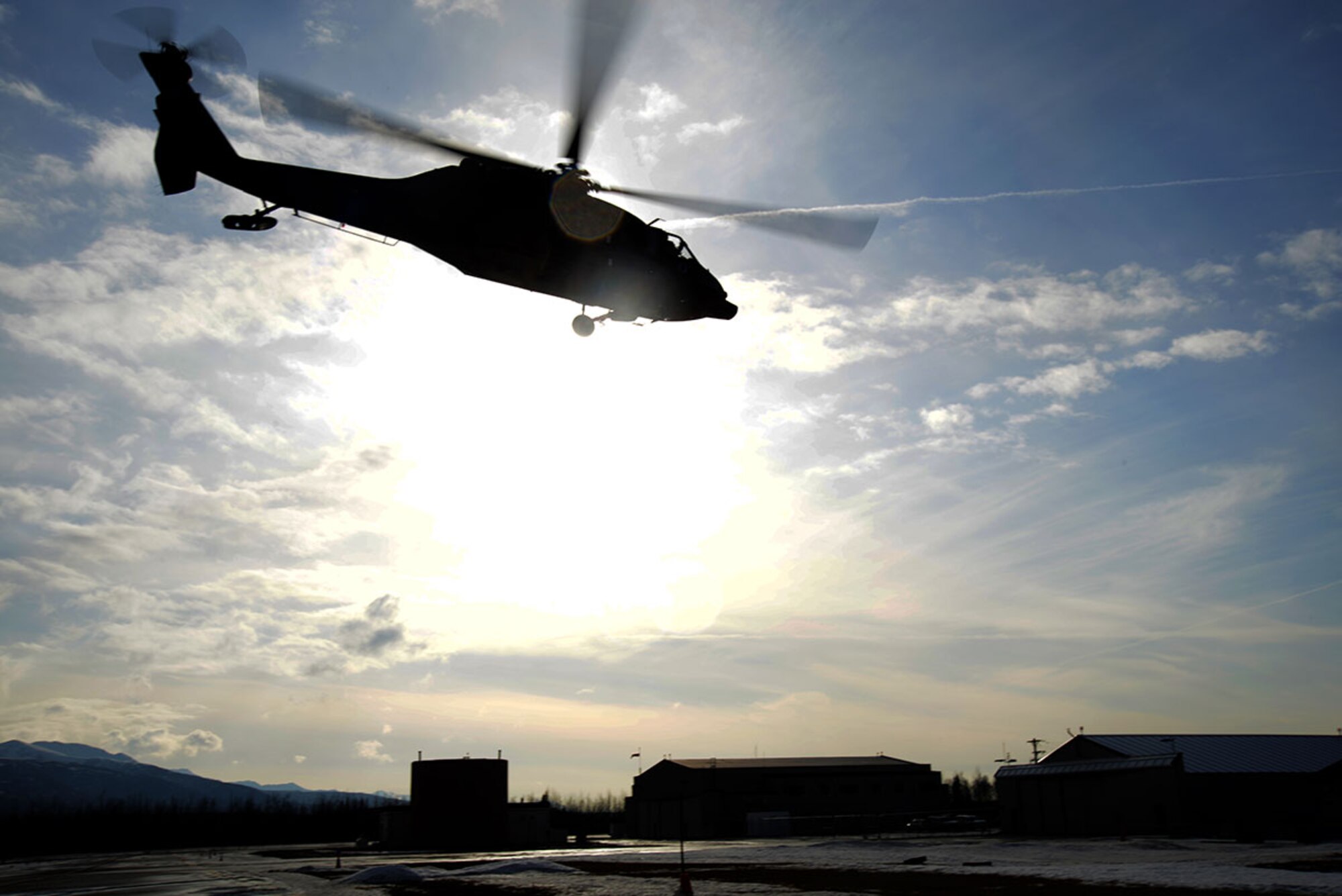 An Alaska Army National Guard UH-60 Black Hawk helicopter assigned to 1st Battalion, 207th Aviation Regiment, Alaska, Feb. 24, 2015 takes off with Alaska Military Youth Center cadets. The Alaska Army National Guard participated in the AMYA outreach program to expose the cadets to military life. (U.S. Air Force photo/Airman Christopher R. Morales)