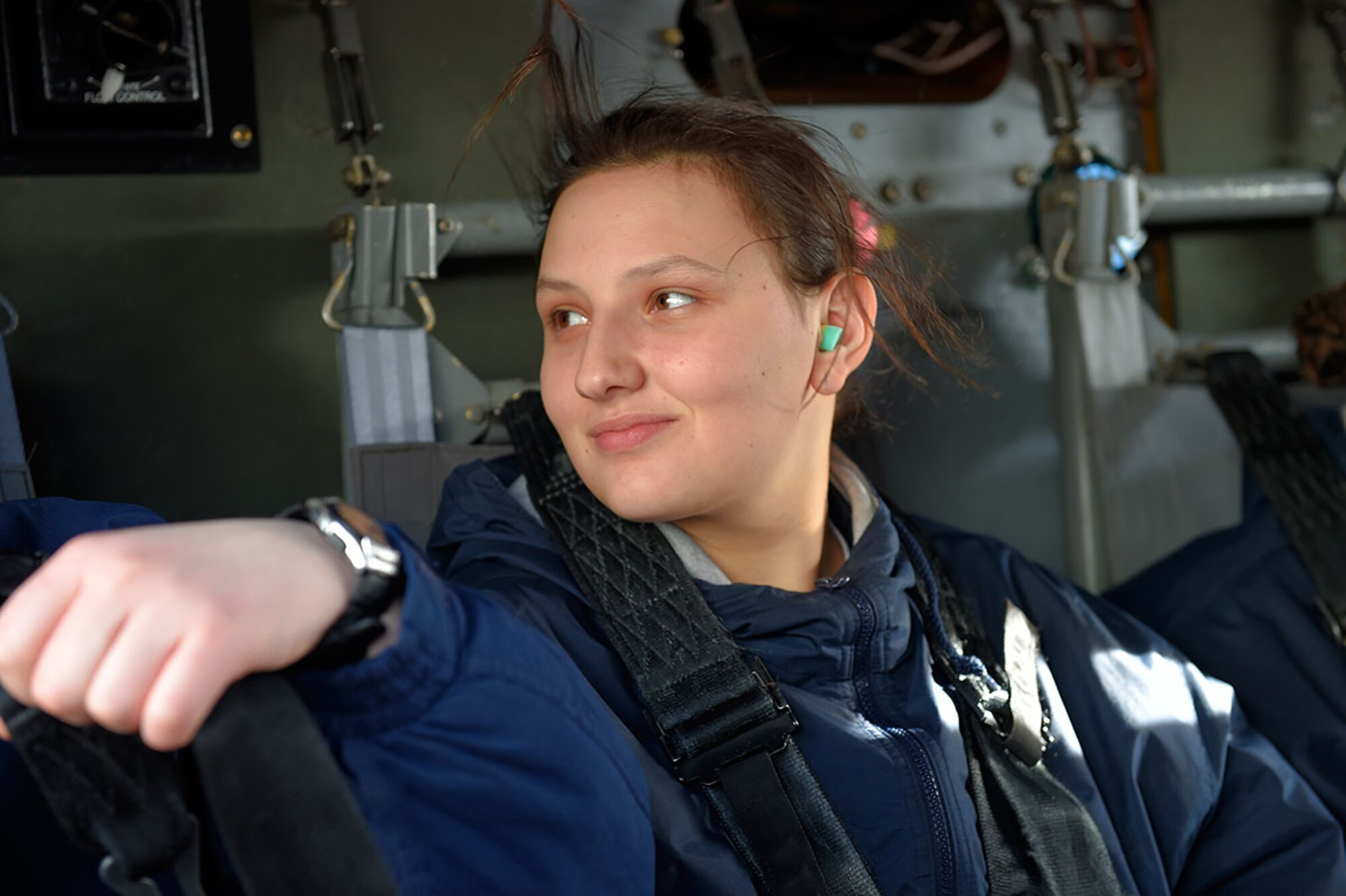 An Alaska Military Youth Academy cadet rides in an Alaska Army National Guard UH-60 Black Hawk helicopter assigned to 1st Battalion, 507th Aviation Regiment on Joint Base Elmendorf-Richardson, Alaska, Feb. 24, 2015. The Alaska Army National Guard participated in the AMYA outreach program to expose the cadets to military life. (U.S. Air Force photo/Alejandro Pena)