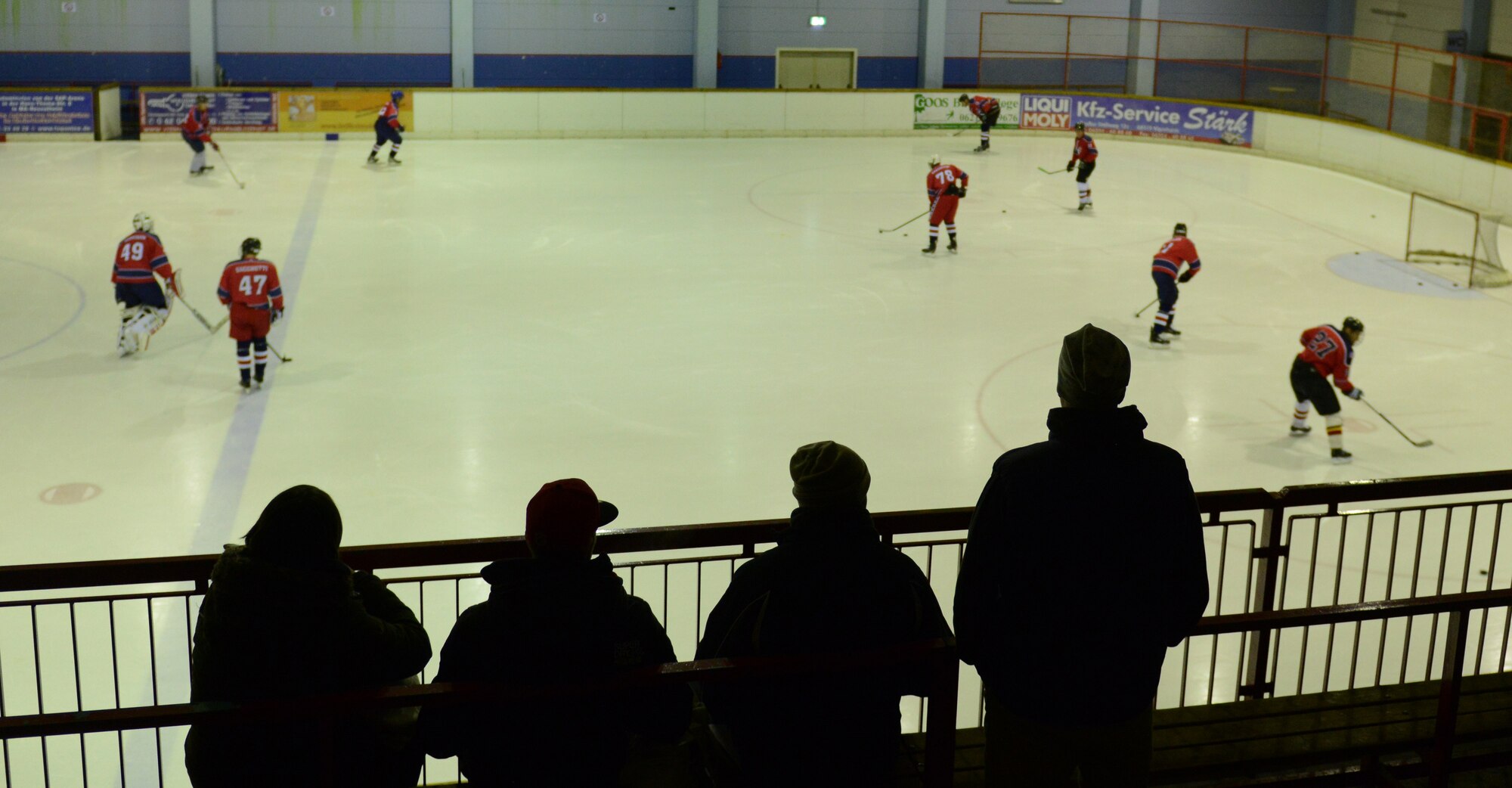Fans watch as the Kaiserslautern Military Community Eagles 1 hockey team warm up before a game against the Export Rangers in Viernheim, Germany, Feb. 25, 2015. The Eagles 1 were named the 23rd annual Armed Forces Alpine Classic Division I Champions during a tournament in Garmisch, Germany. (U.S. Air Force photo/A1C Tryphena Mayhugh) 