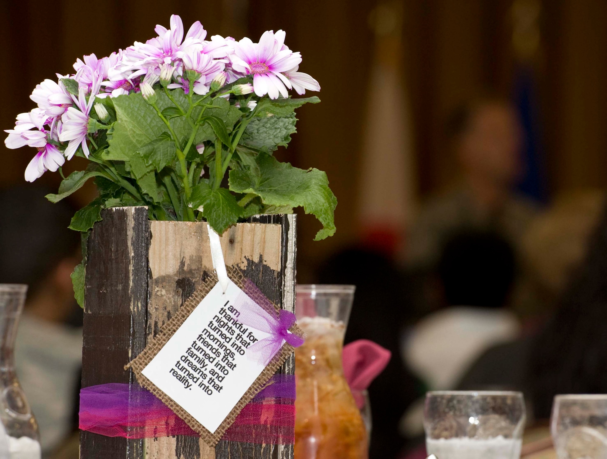 Members of the Misawa community attended the National Prayer Luncheon at Misawa Air Base, Japan, March 5, 2015. Flowers were placed around the room with attached quotes and phrases as decoration for the event. (U.S. Air Force photo by Airman 1st Class Jordyn Rucker/Released)