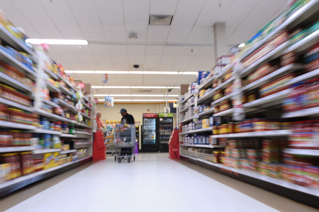 Shoppers browse the aisles of the Commissary at Columbus Air Force Base, Mississippi, March 3, 2015. Since the middle of February, new products have been added to the Commissary Value program to include several cheeses, condiments, canned and powdered milk, canned soup, dry pasta, honey, rice, laundry bleach and paper towels. The average savings for Value Brand is about 42 percent when compared to national brands and 25 percent against the store brand and private label items found in commercial retail stores. (U.S. Air Force photo by Senior Airman Stephanie Englar)
