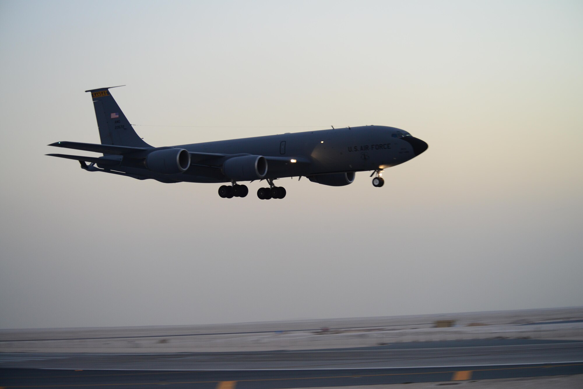 A KC-135 Stratotanker prepares to land on the flightline, Feb. 26, 2015, at Al Udeid Air Base, Qatar. Air refueling provided by the 340th Expeditionary Air Refueling Squadron’s KC-135 Stratotankers, which supports all mission sets, gives aircraft the reach capability to accomplish the Combined Forces Air Component Commander’s air campaign objectives in the region. (U.S. Air Force photo by Senior Airman Kia Atkins)