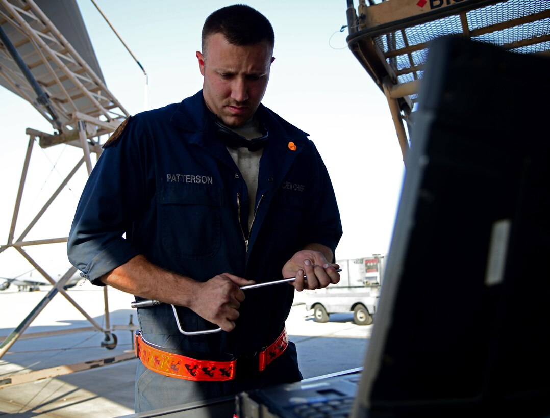 U.S. Air Force Senior Airman Cody Patterson, 34th Expeditionary Aircraft Maintenance Unit, searches his tool box, March 1, 2015, at Al Udeid Air Base, Qatar. Patterson, a native of Marion, Va., who deployed here from Ellsworth Air Force Base, S.D., is a dedicated crew chief of the 34th Expeditionary Bomb Squadron flagship. Patterson maintains and facilitates maintenance on the B-1B Lancer. This is Patterson’s second deployment to Al Udeid. (U.S. Air Force photo by Senior Airman Kia Atkins)