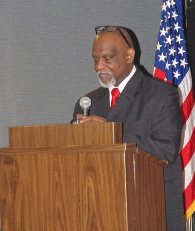 Audwin (Darrell) Davis, Director of Huntsville Center's Resource Managmeent Directorate leads prayer.