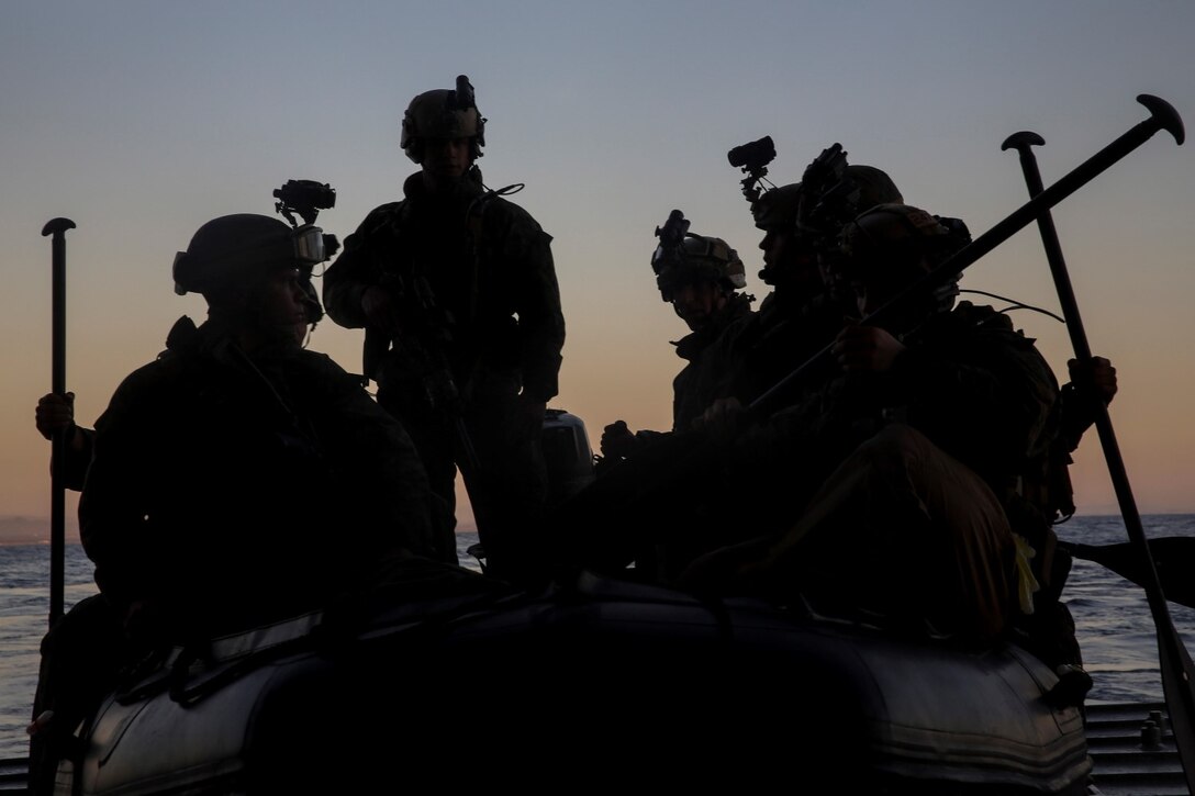 U.S. Marines with the 15th Marine Expeditionary Unit’s Maritime Raid Force prepare to disembark the USS Essex (LHD 2) during Amphibious Squadron/Marine Expeditionary Unit Integration Training (PMINT) off the coast of San Diego March 4, 2015. These Marines are practicing a variety of full-mission profiles so they are well-prepared for anything that comes up during their deployment. (U.S. Marine Corps photo by Cpl. Anna Albrecht/Released)
