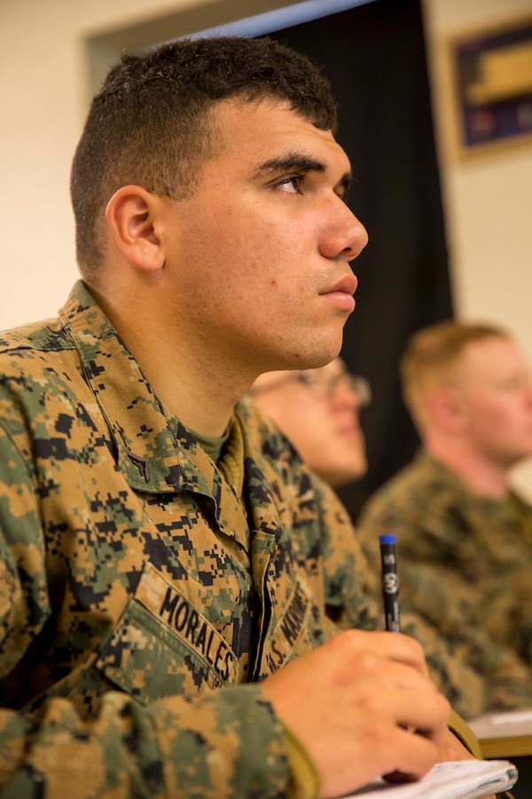 Lance Cpl. Roberto Morales, a combat engineer with Alpha Company, 2nd Combat Engineer Battalion, 2nd Marine Division, listens to a period of instruction over improvised explosive devices while participating in a week-long, Counter-IED Course aboard Camp Lejeune, N.C., March 2-5, 2015. The course was implemented as a way to help maintain 2nd CEB’s readiness to provide close combat engineer support to the 2nd Marine Division and enhance their mobility, counter-mobility, and survivability while in any theatre of operation. (U.S. Marine Corps photo by Cpl. Krista James/Released)