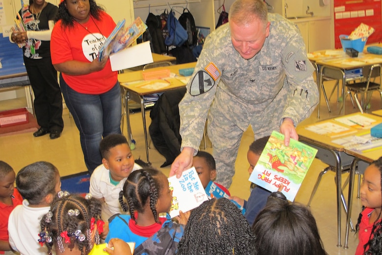 Huntsville Center Commander, Col. Robert Ruch, joined Huntsville Center employees to read books to students at Rolling Hills Elementary School March 2 as part of National Read Across America Day.