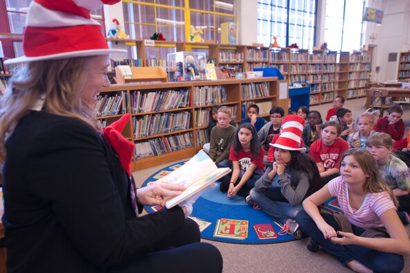 Susie Galea, mayor of Alamogordo, NM, reads ‘There’s a Wocket in my Pocket’ to a class of fifth grade students at Holloman Elementary School, March 6, at Holloman Air Force Base, NM. The National Education Association designated Read Across America as a week-long celebration of reading in honor of Dr. Seuss’s birthday and the fact he was one of the biggest advocates of reading. (U.S. Air Force Photo by Staff Sgt. E’Lysia A. Wray/Released)