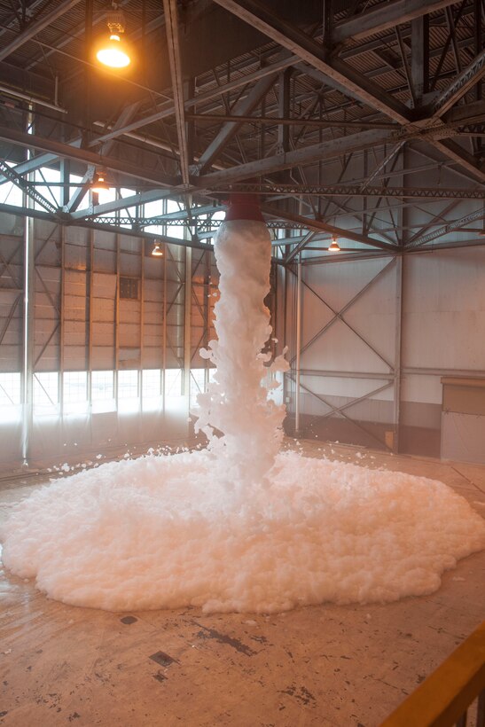 Foam quickly fills up a hangar as part of a functional test of the high expansion foam fire suppression system in the  307th Aircraft Maintenance Squadron hangar on Barksdale Air Force Base, Louisiana on March 4th. This successful test culminates over a year’s worth of work from multiple civilian contractors to install the new system. (U.S. Air Force photo by Master Sgt. Dachelle Melville/Released)