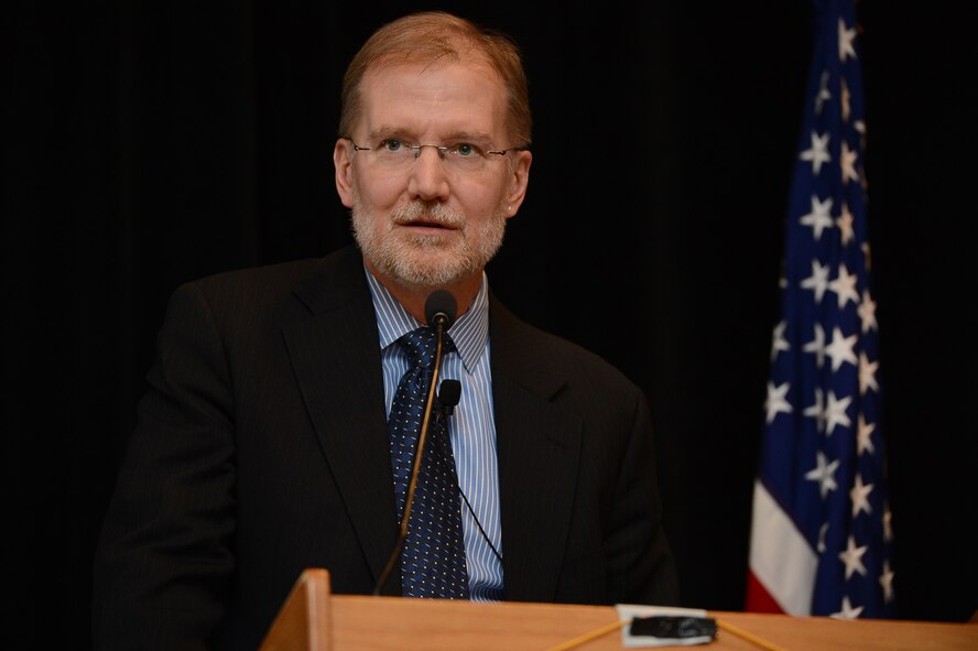 Steven Wert, Battle Management program executive officer, addresses a group of government, academia and industry representatives during AFCEA's 2015 New Horizons event in Newton, Mass., March 4. Wert spoke to JSTARS Recapitalization, the Air Force's Bending the Cost Curve initiative as well as listed future business opportunities within his directorate. (U.S. Air Force photo by Jerry Saslav)