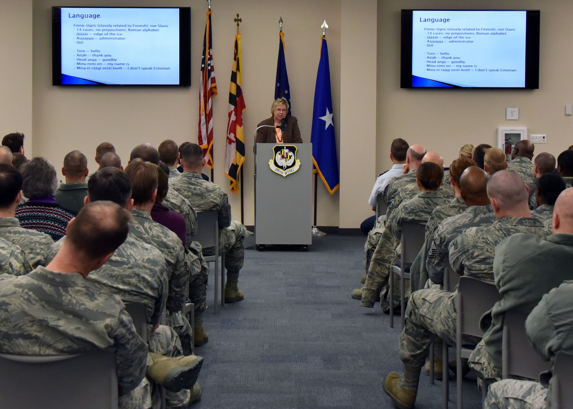 Marju Rink-Abel, president of the Estonian American National council, speaks at Warfield Air National Guard Base on February 8, 2015. Rink-Abel provided Maryland Air National Guardsmen a detailed overview of Estonia, Maryland’s State Partnership Program partner since 1993, Many of the Airmen have either been to Estonia or will go in the near future. (U.S. Air National Guard photo by 2nd Lt. Benjamin Hughes/RELEASED) 