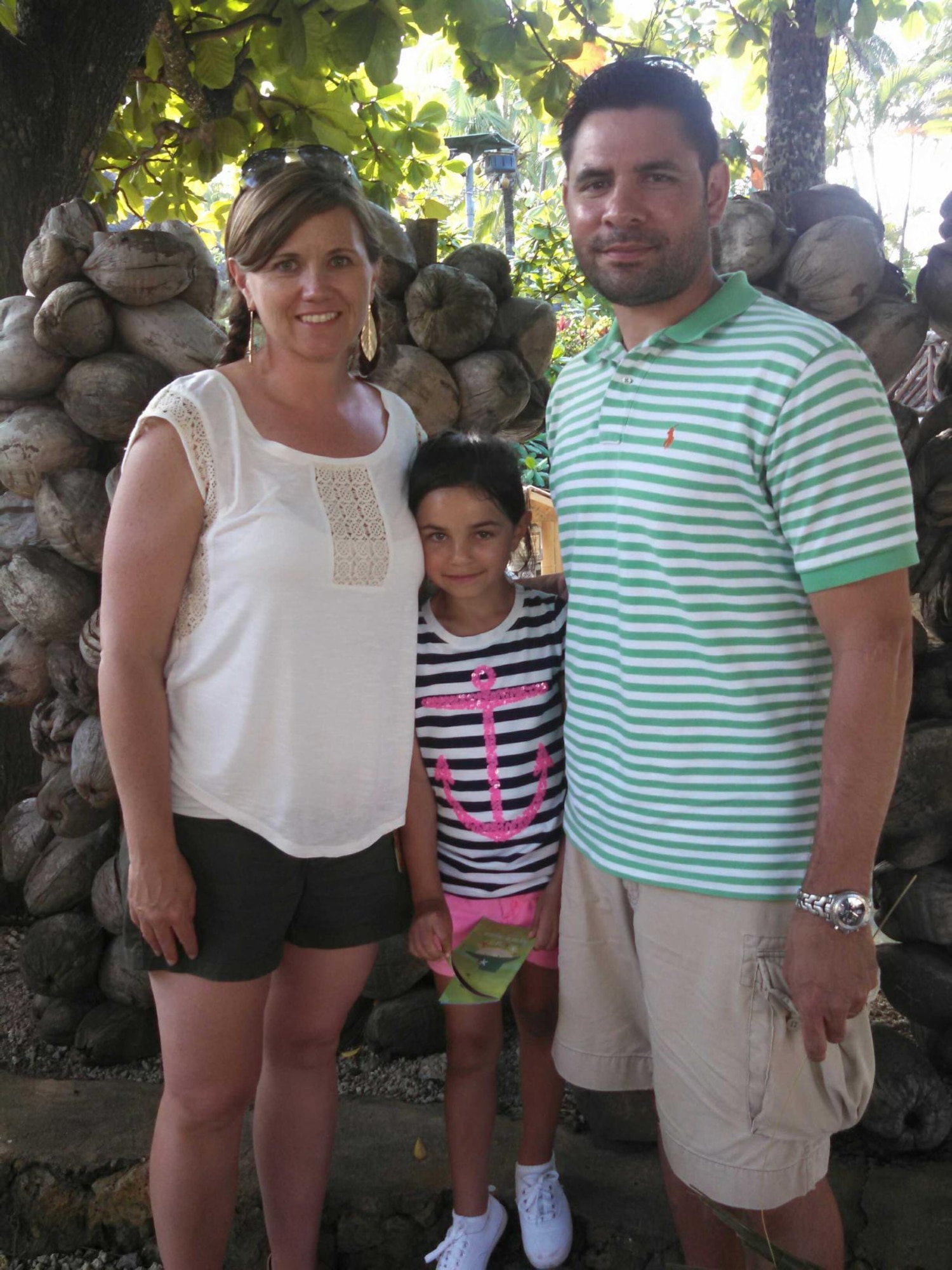 Master Sgt. Emily Gazzaway, the Air Force Academy's senior enlisted aide, and her husband Tech. Sgt. Billy Gazzaway, assigned to the 21st Communications Squadron at Peterson Air Force Base, pose for a photo with their daughter Avery. The Gazzaways say Air Force mental health services helped them cope with the loss of their son to leukemia, and encourage Air Force supervisors to make sure their Airmen are aware of the many support services available to them. (Courtesy photo)