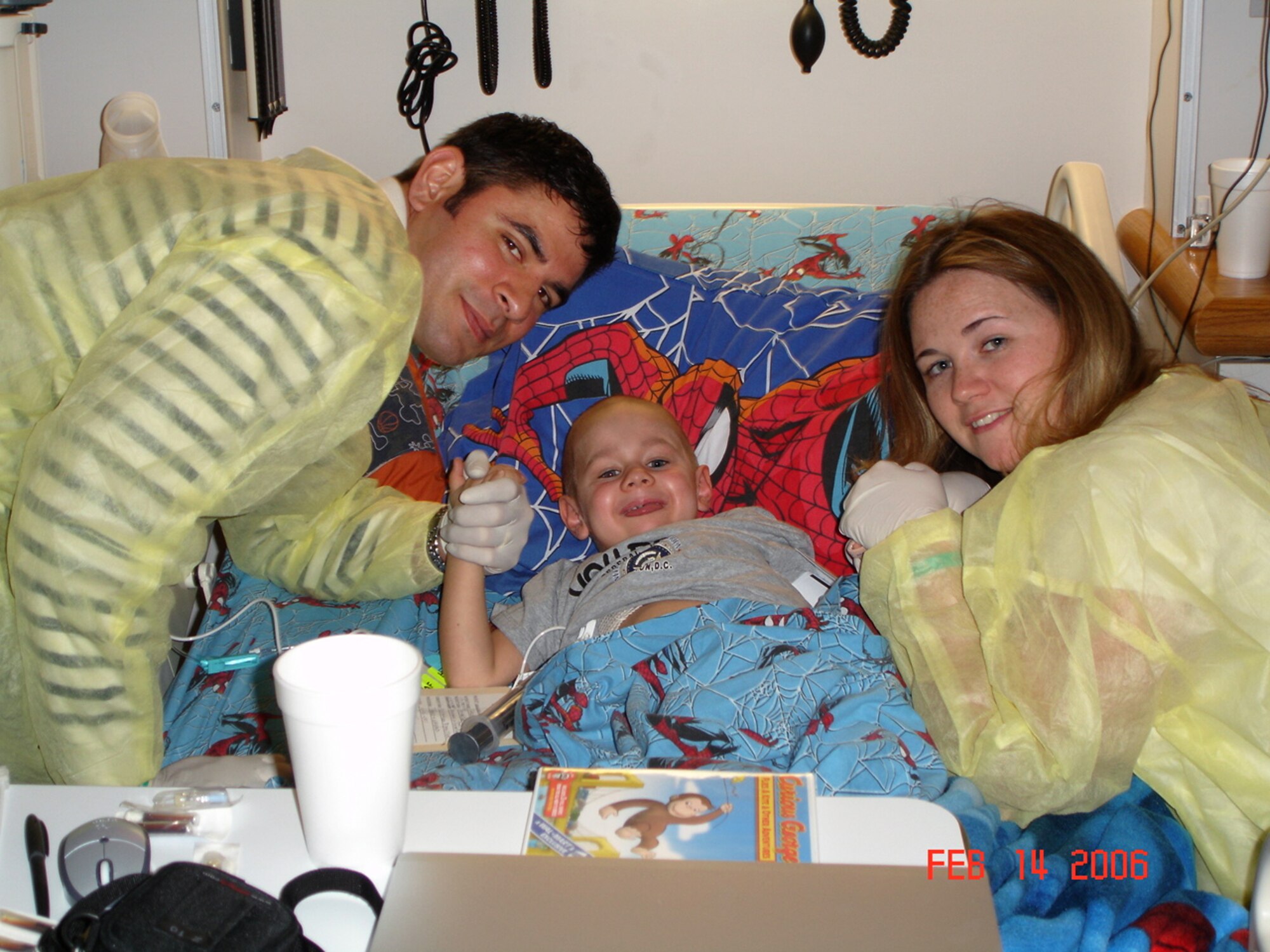 Tech. Sgt. Billy Gazzaway, assigned to the 21st Communications Squadron at Peterson Air Force Base, and wife Master Sgt. Emily Gazzaway, the Air Force Academy's senior enlisted aide, take a photograph with their son, John Kadin Gazzaway, in February 2006. Kadin died of leukemia May 2, 2006. The Gazzaways said Air Force mental health services helped them recover from their loss and encourage Airmen to take advantage of the support services available to them when they need help. (Courtesy photo)