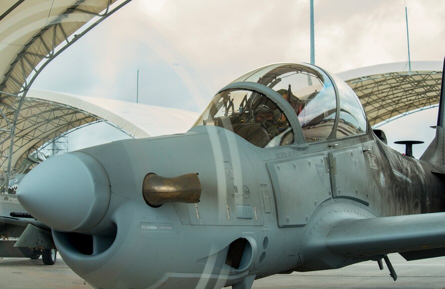 An Afghan Air Force student pilot from the 81st Fighter Squadron, prepares for the first Afghan ‘in seat’ flight in an A-29 Super Tucano March 5, 2015, at Moody Air Force Base, Ga. The Afghan pilot was evaluated throughout the flight by the instructor. (U.S. Air Force photo by Airman 1st Class Ceaira Tinsley/Released)