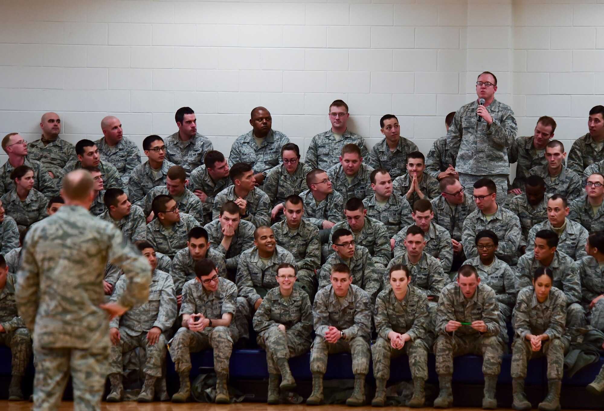 Chief Master Sgt. of the Air Force James A. Cody answers a question from the audience during an enlisted call March 5, 2015, at Buckley Air Force Base, Colo. Cody visited Buckley to visit with Airmen and better understand the base mission.. (U.S. Air Force photo by Airman 1st Class Luke W. Nowakowski/Released)