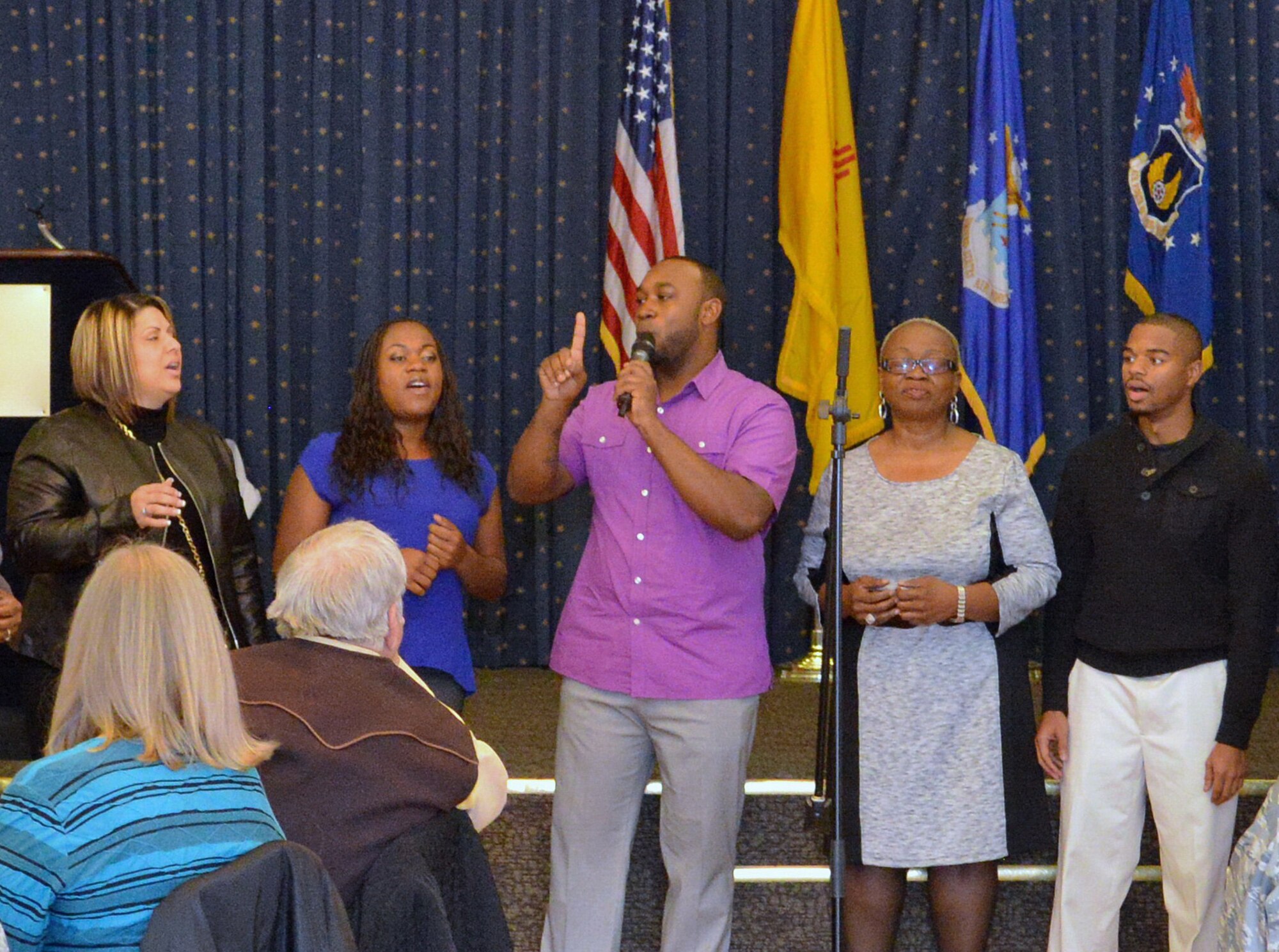 God’s House Choir performs at the National Prayer Breakfast March 3 at the Mountain View Club. The annual event is designed to be a forum for individuals to assemble and build relationships in a spiritual setting. (Photo by Jamie Burnett)