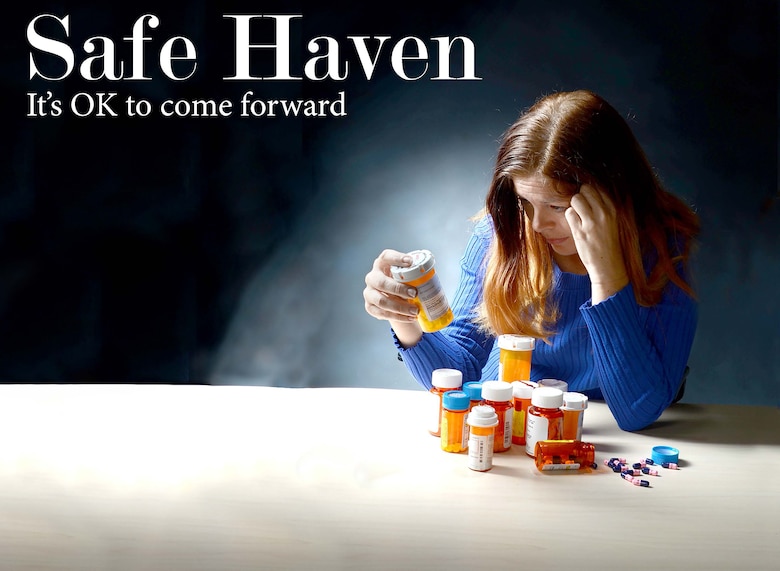To best represent the struggles that go along with substance abuse problems, Robins Public Affairs photographer Tommie Horton asked Angela Woolen, Rev-Up reporter, to model for the photo illustration used on the front page of the base newspaper. Although prescription drugs were used for the illustration, all substance abuse problems are serious, and help is available. (U.S. Air Force photo illustration by Tommie Horton)
