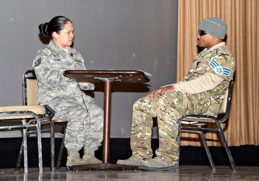 In a skit during Back to Blue Feb. 26, Tech. Sgt. Joan Frantz, 72nd Air Base Wing Equal Opportunity Office, demonstrates intrusive leadership while counseling “Senior Airman Cash” on his financial and appearance troubles. This was just one of several skits Airmen performed on leadership. Through the quarterly Back to Blue events, 72nd Air Base Wing and Tinker Installation Command Chief Master Sgt. Thomas Christopher hopes to emphasize professionalism and the Wingman culture. The next event, scheduled for April 30 at the Maj. Charles B. Hall Memorial Air Park flagpole, will recognize Vietnam veterans. (Air Force photo by Kelly White)