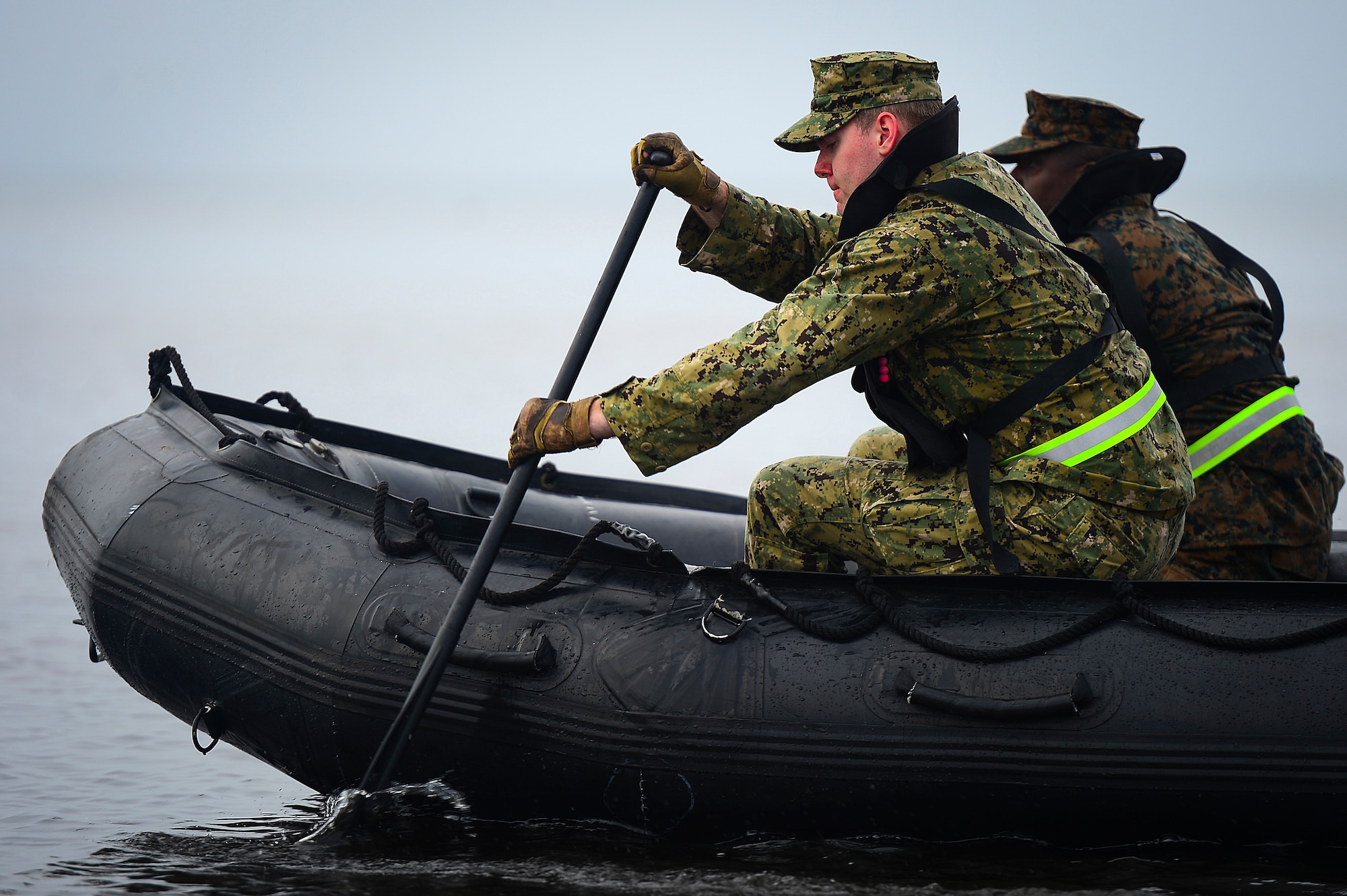 Two members of the Joint Communications Support Element row a boat through Hillsborough Bay for a timed event during Warrior Spirit ’15 at MacDill Air Force Base, Fla., March 2, 2015. JCSE members were tested on their ability to work as a team during Warrior Spirit. (U.S. Air Force photo by Senior Airman Ned T. Johnston/Released)
