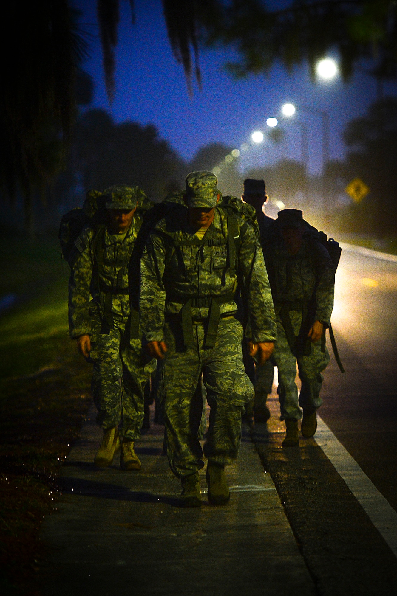 Members of the Joint Communications Support Element complete a 4.2-mile ruck march during Warrior Spirit ’15 at MacDill Air Force Base, Fla., March 2, 2015. Warrior Spirit assessed JCSE members readiness to deploy and areas of their job where they might need more training. (U.S. Air Force photo by Senior Airman Ned T. Johnston/ Released)