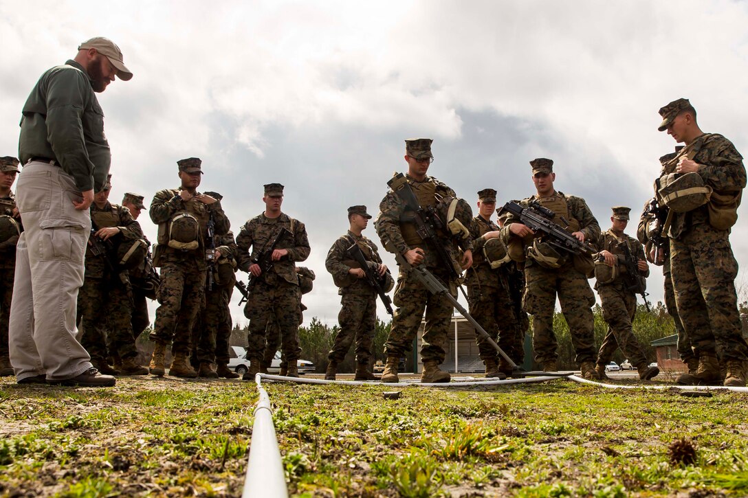 Lance Cpl. Ryan Zerites, a combat engineer with Alpha Company, 2nd Combat Engineer Battalion, 2nd Marine Division, practices implementing the Compact Metal Detector during the practical application portion of a week-long Counter-IED course aboard Camp Lejeune, N.C., March 2-5, 2015. The course included classes covering individual preparedness in an improvised explosive device environment, small unit leader considerations in an IED environment, homemade explosives and a metal detector operator’s course. (U.S. Marine Corps photo by Cpl. Krista James/Released)